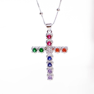 Collar de cruz en covergold