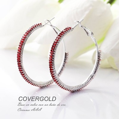 Aretes en covergold con baño en Rodio