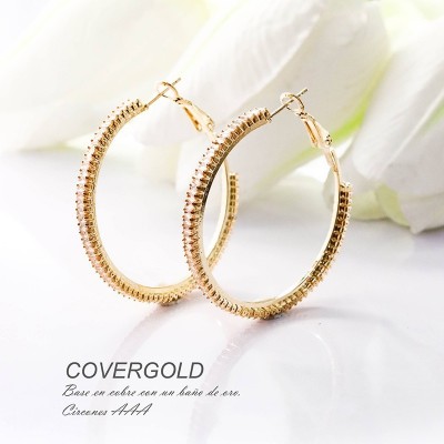 Aretes en covergold con baño en Rodio