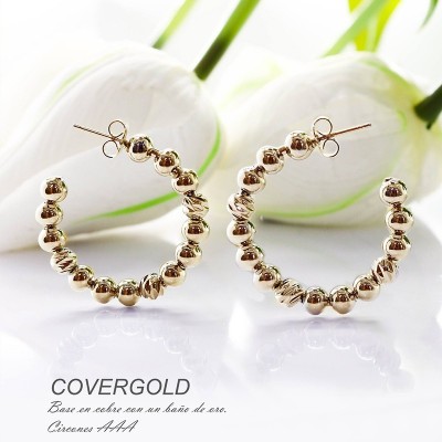 Aretes en covergold con baño en Rodio