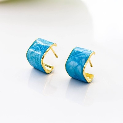 Aretes en covergold con baño en Rodio