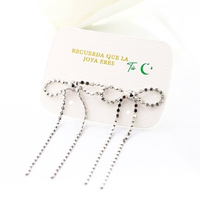 Aretes de moño en covergold con baño en Rodio