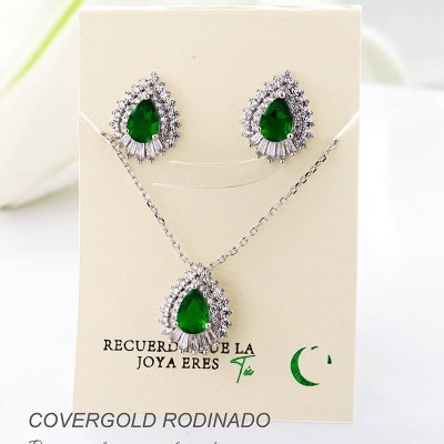 Set collar y aretes en covergold con baño en Rodio
