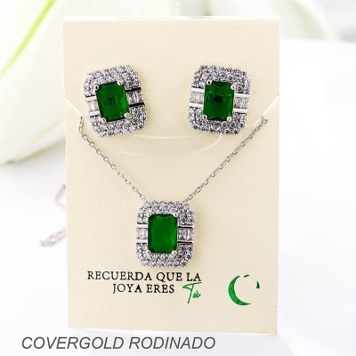 Set collar y aretes en covergold con baño en Rodio