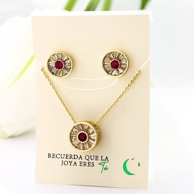 Set collar y aretes en covergold con baño en Rodio