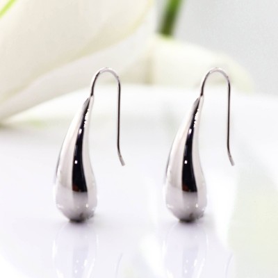 Aretes de gota en covergold con baño en Rodio