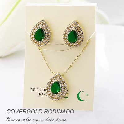 Set collar y aretes en covergold con baño en Rodio