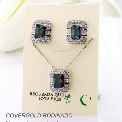 Set collar y aretes en covergold con baño en Rodio