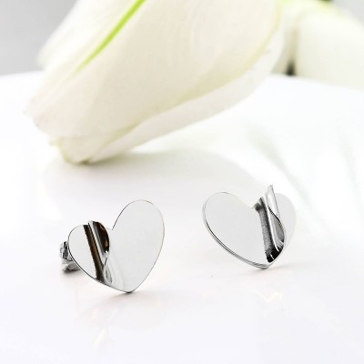 Aretes de corazon en covergold con baño en Rodio