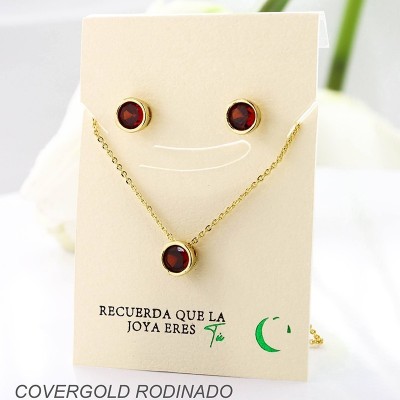 Set collar y aretes en covergold con baño en Rodio