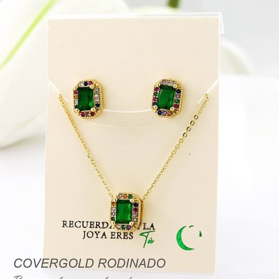 Set collar y aretes en covergold con baño en Rodio