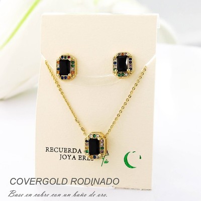 Set collar y aretes en covergold con baño en Rodio