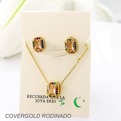 Set collar y aretes en covergold con baño en Rodio