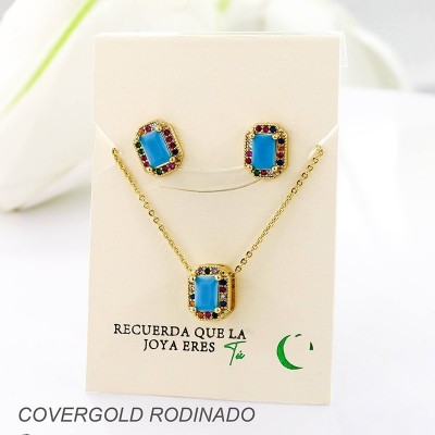 Set collar y aretes en covergold con baño en Rodio