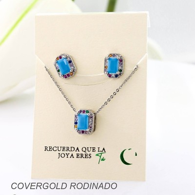 Set collar y aretes en covergold con baño en Rodio