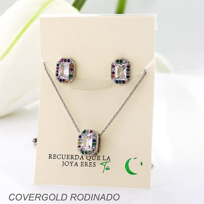 Set collar y aretes en covergold con baño en Rodio