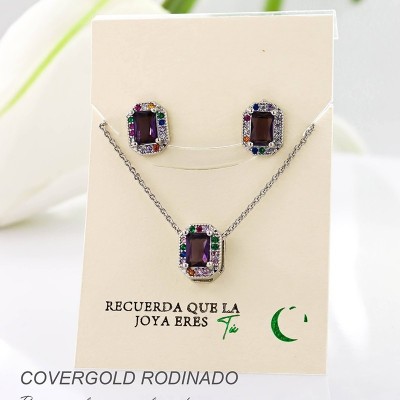 Set collar y aretes en covergold con baño en Rodio