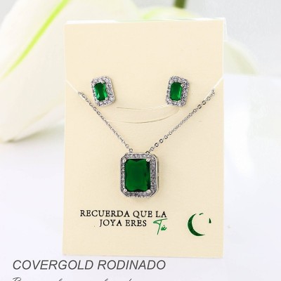 Set collar y aretes en covergold con baño en Rodio