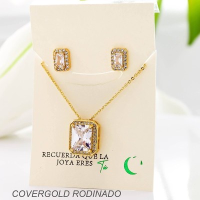 Set collar y aretes en covergold con baño en Rodio