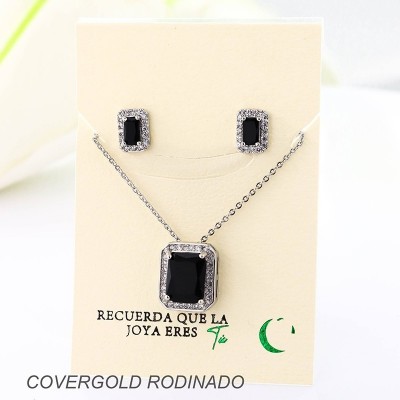 Set collar y aretes en covergold con baño en Rodio