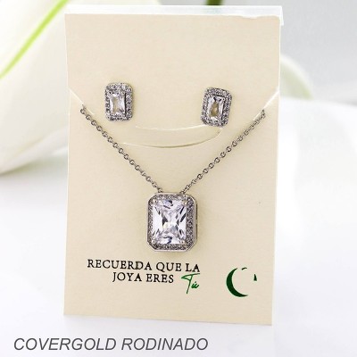 Set collar y aretes en covergold con baño en Rodio