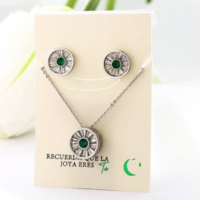 Set collar y aretes en covergold con baño en Rodio
