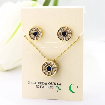 Set collar y aretes en covergold con baño en Rodio