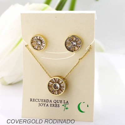 Set collar y aretes en covergold con baño en Rodio