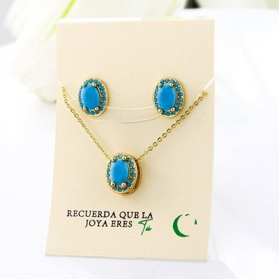 Set collar y aretes en covergold con baño en Rodio