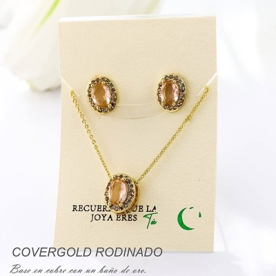 Set collar y aretes en covergold con baño en Rodio