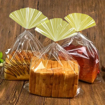 Bolsa celofan con fuelle y amarre paquete x 100