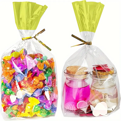 Bolsa celofan con fuelle y amarre paquete x 100