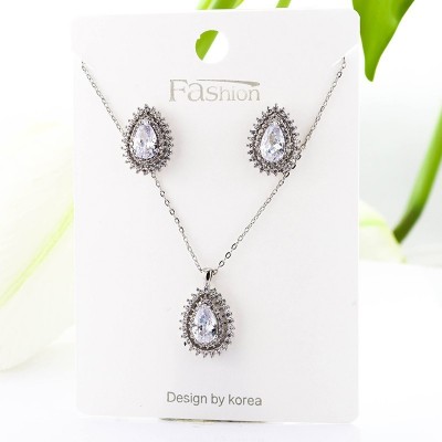 Set collar y aretes en Rodio